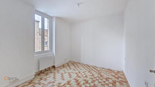 Immeuble de rapport avec appartement et local commercial