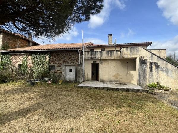 ENSEMBLE IMMOBILIER COMPOSE DE DEUX MAISONS - 2 GARAGES ET GRANGE