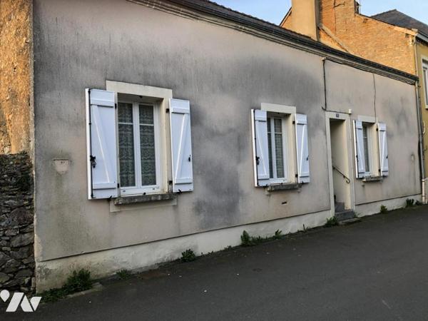 Vente sur la commune de Auvers Le Hamon une maison d'habitation avec jardin