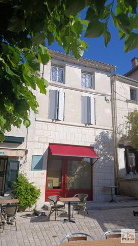 Immeuble avec local commercial et appartement 3 pièces
