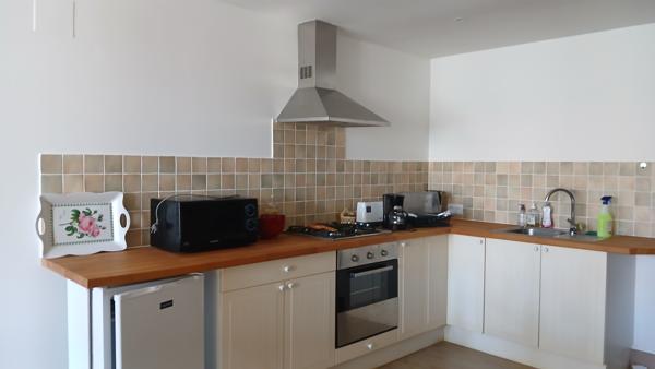 Immeuble avec local commercial et appartement 3 pièces