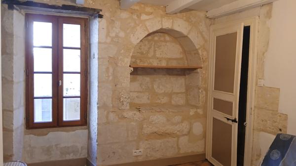 Immeuble avec local commercial et appartement 3 pièces