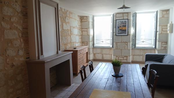 Immeuble avec local commercial et appartement 3 pièces
