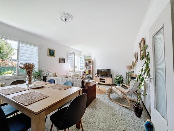 Immeuble 4 appartements fort potentiel.