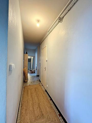 Immeuble 4 appartements fort potentiel.