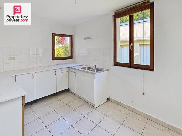 Immeuble Maison, 8 boxs-garage et atelier-hangar