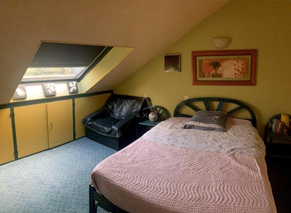 Elegante contemporaine de 202m2 au coeur d'un terrain arboré de 3500m2