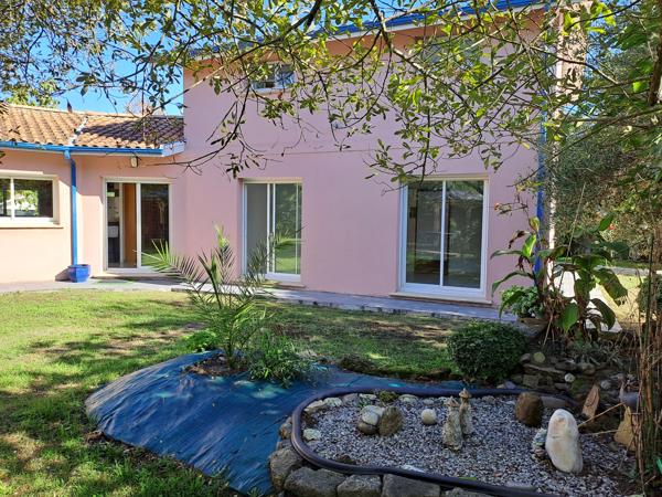 Maison familiale sur jolie parcelle végétalisée