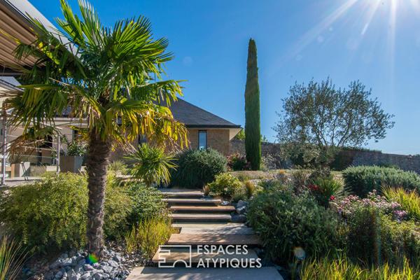 Maison contemporaine avec vue dégagée et matériaux nobles
