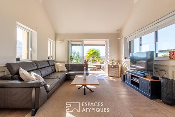Maison contemporaine avec vue dégagée et matériaux nobles