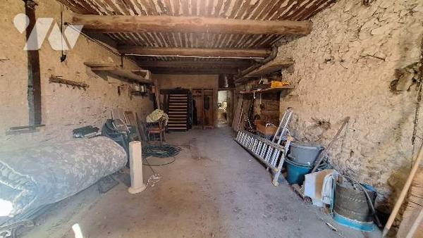 Batisse avec terrain constructible