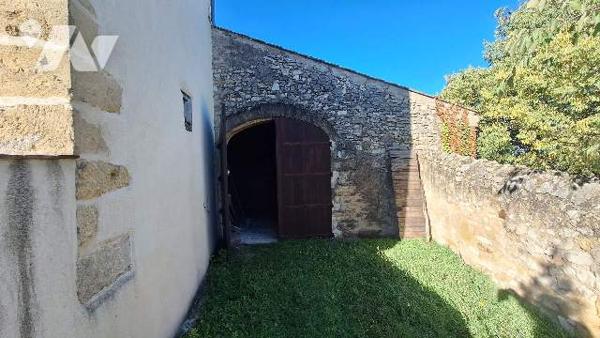 Batisse avec terrain constructible