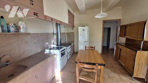 Batisse avec terrain constructible