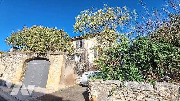 Batisse avec terrain constructible