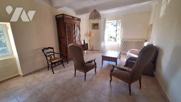 Batisse avec terrain constructible