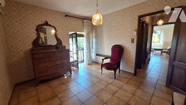 Batisse avec terrain constructible