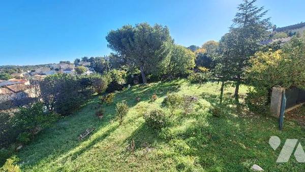 Batisse avec terrain constructible