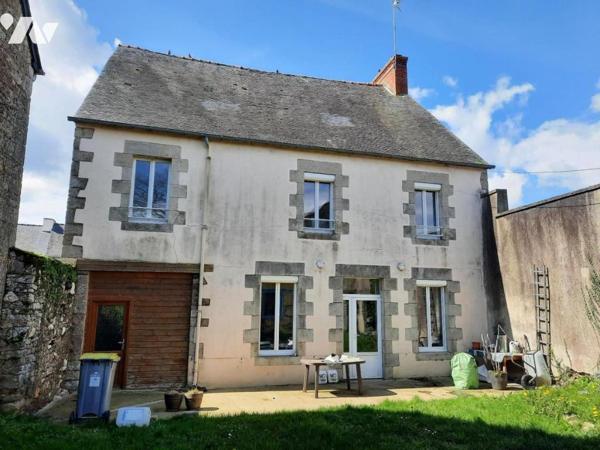 Immeuble commercial + 2 logements