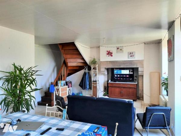 Immeuble commercial + 2 logements