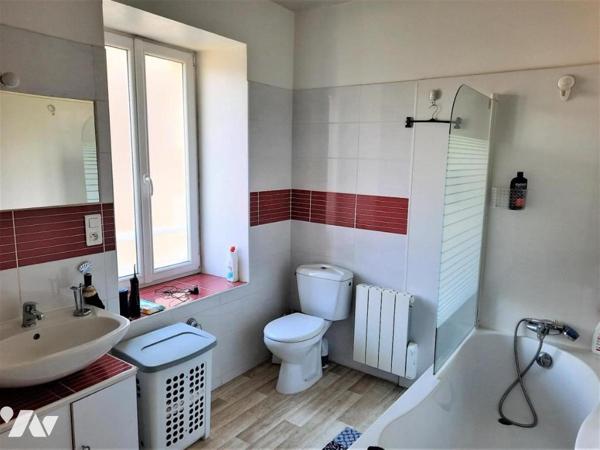 Immeuble commercial + 2 logements