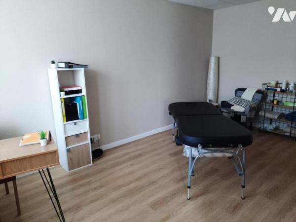 Immeuble commercial + 2 logements