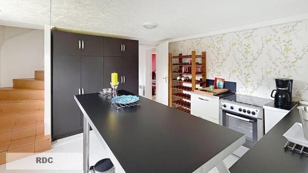 Maison familiale 8 pièces – 220 m² – Terrain paysagé 1 400 m²