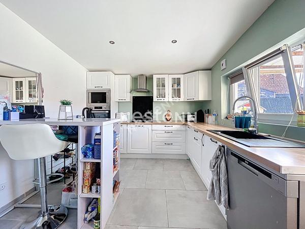 Maison semi-individuelle - 80m² - 3 chambres - garage - jardin - secteur calme.