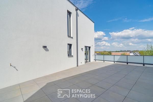 Duplex contemporain comme une maison