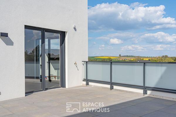Duplex contemporain comme une maison