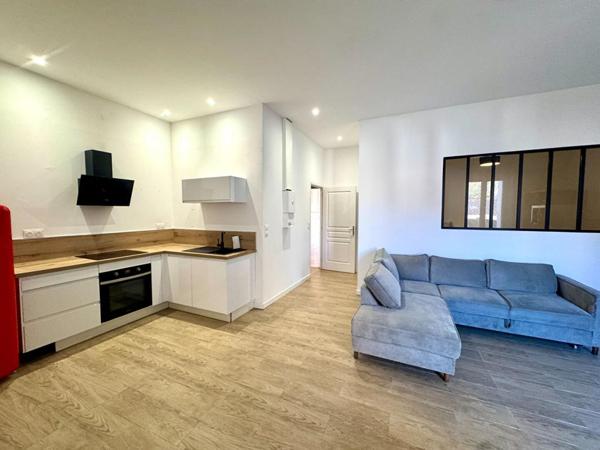 IMMEUBLE AVEC APPARTEMENT ET LOCAL COMMERCIAL