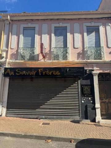 IMMEUBLE AVEC APPARTEMENT ET LOCAL COMMERCIAL