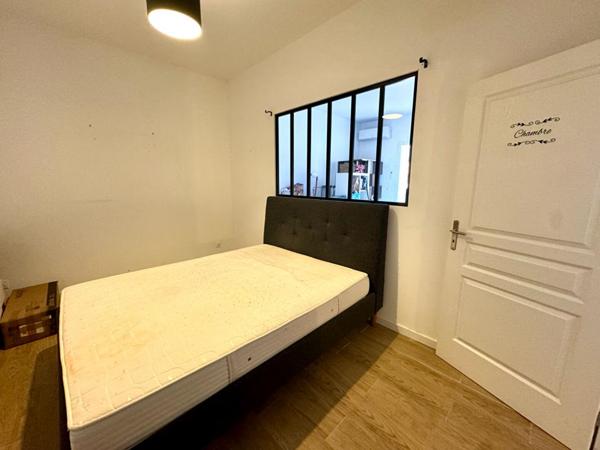 IMMEUBLE AVEC APPARTEMENT ET LOCAL COMMERCIAL