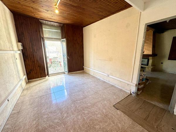 IMMEUBLE AVEC APPARTEMENT ET LOCAL COMMERCIAL