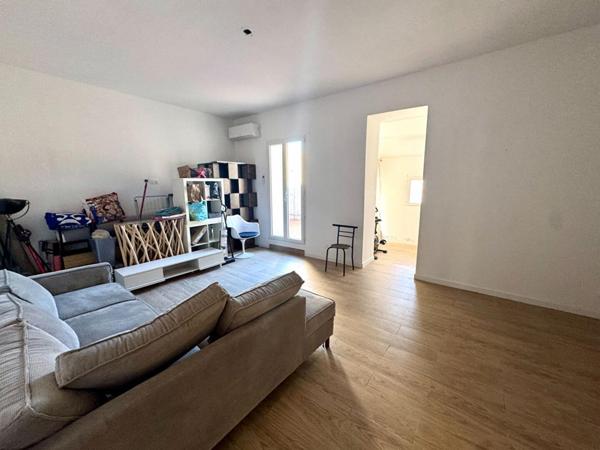 IMMEUBLE AVEC APPARTEMENT ET LOCAL COMMERCIAL