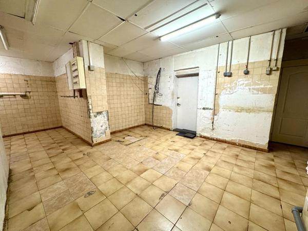 IMMEUBLE AVEC APPARTEMENT ET LOCAL COMMERCIAL