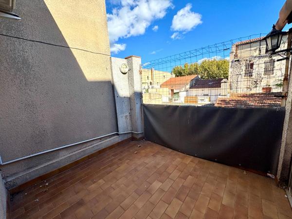 IMMEUBLE AVEC APPARTEMENT ET LOCAL COMMERCIAL