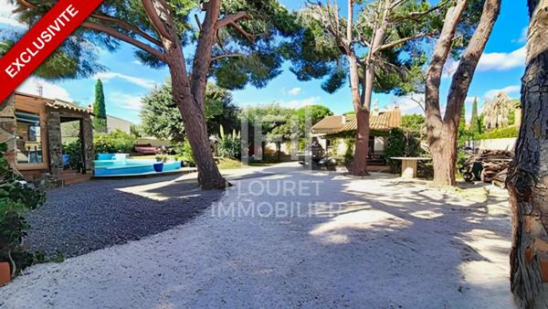 Villa de plain-pied sur 1200 m² avec piscine et 2 dépendances