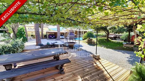Villa de plain-pied sur 1200 m² avec piscine et 2 dépendances