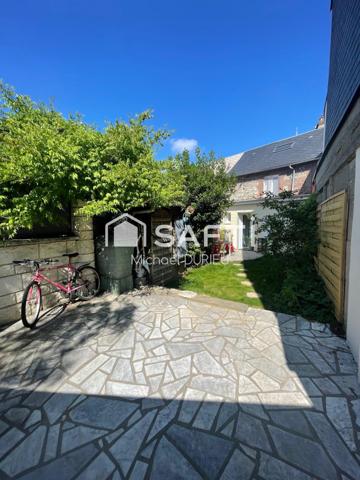 Maison ,jardin ,garage proche commerce,transport