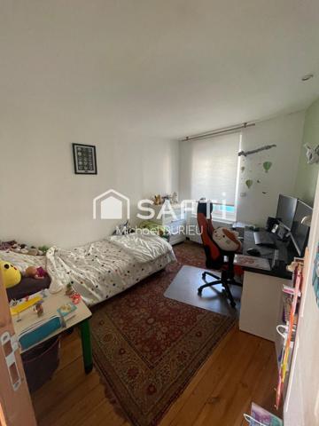 Maison ,jardin ,garage proche commerce,transport