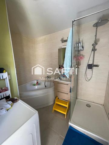 Maison ,jardin ,garage proche commerce,transport