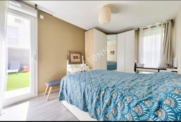 Bezons - Appartement familial 4 pièces en rez-de-jardin avec terrasse et jardin privatif