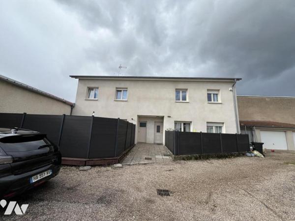 Maison d'habitation mitoyenne