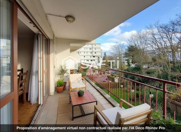 Appartement T3 proche centre-ville avec terrasses, cave et box.