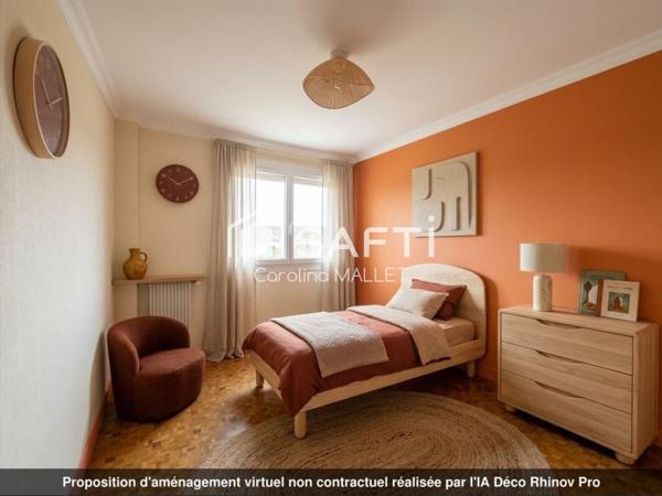 Appartement T3 proche centre-ville avec terrasses, cave et box.
