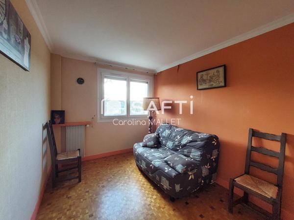 Appartement T3 proche centre-ville avec terrasses, cave et box.