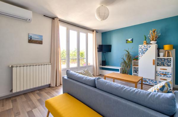 AGEN - Appartement traversant de 92 m² dans une résidence sécurisée, composée de 3 chambres, balcon, loggia et garage