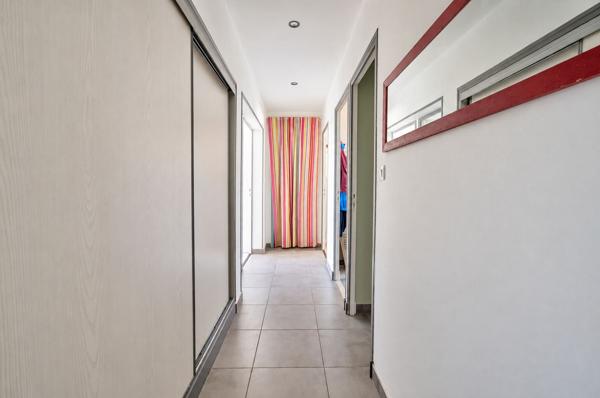 AGEN - Appartement traversant de 92 m² dans une résidence sécurisée, composée de 3 chambres, balcon, loggia et garage