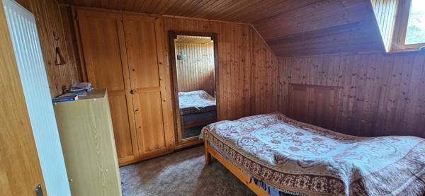 Ensemble de deux granges dont une avec habitation.