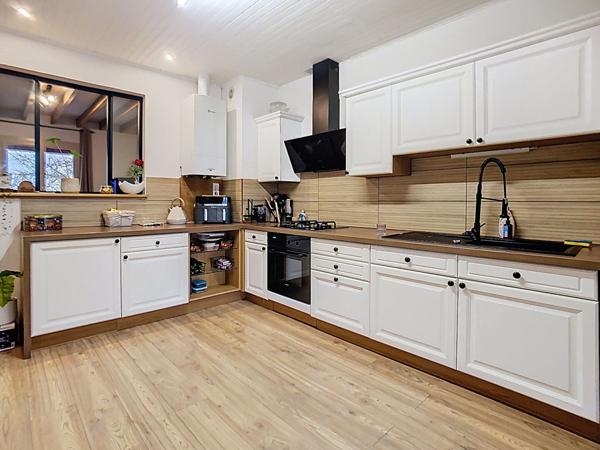 A vendre Maison 4 chambres, garage et jardin à Bouglon